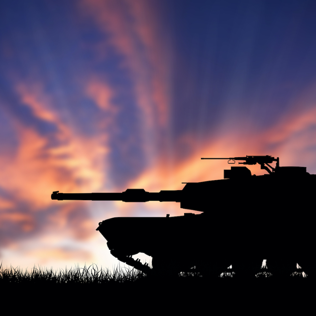 Dark silhouette of a tank at sunset - square